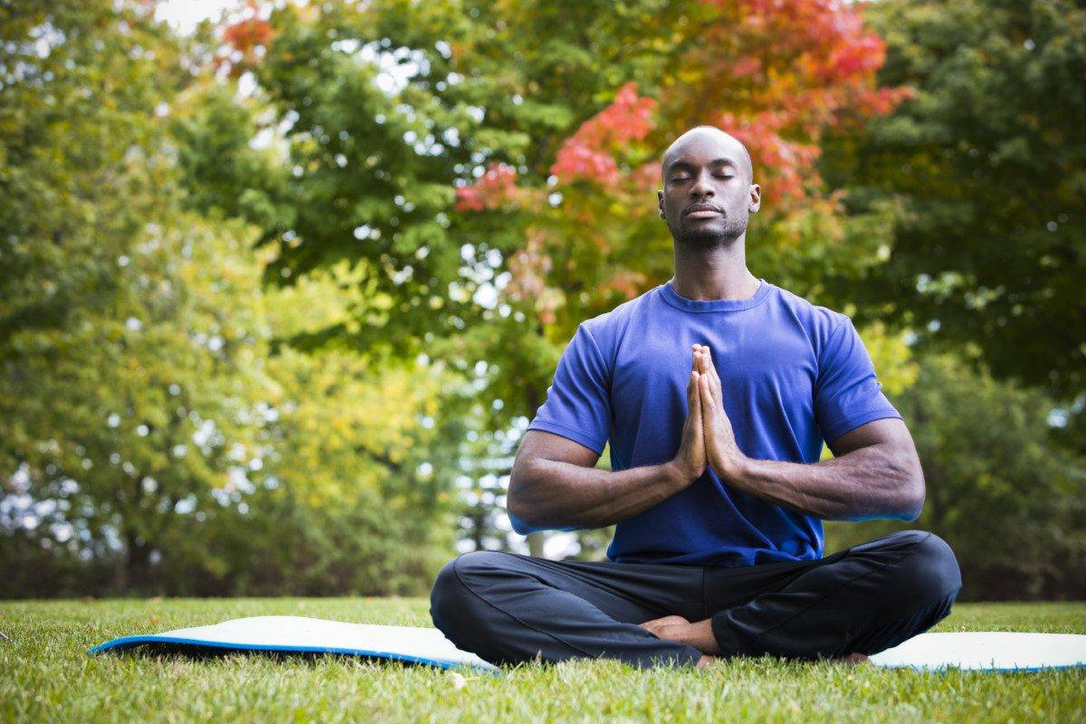 young man exercising yoga