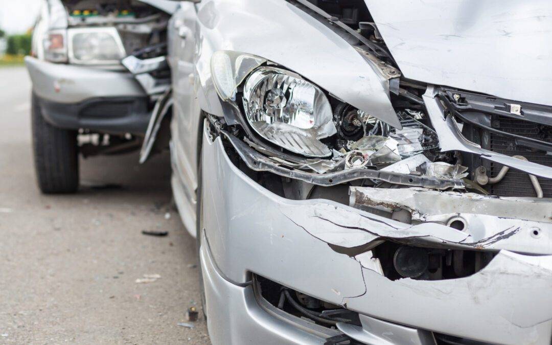 Modern car accident involving two cars on the road